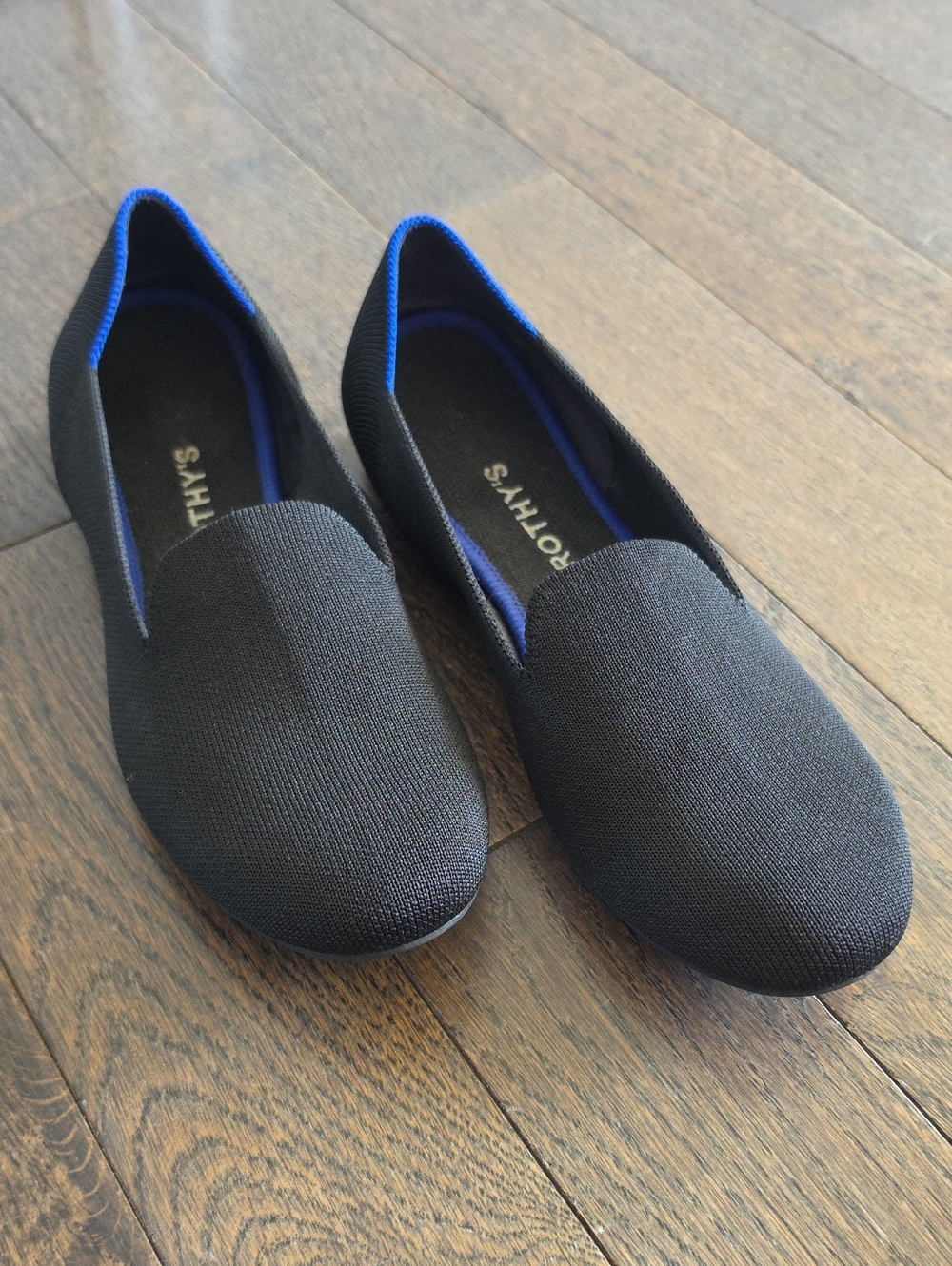Rothy's Black Slip-On Loafers with Blue Trim